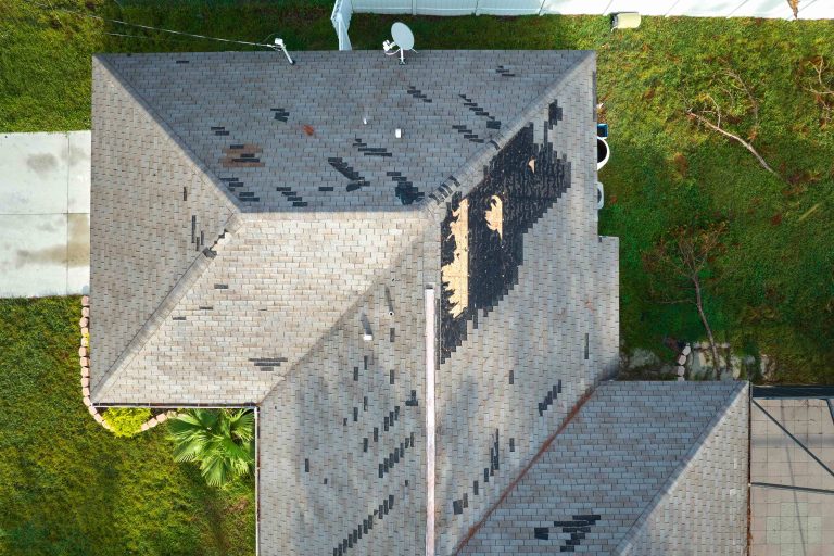 Is Your Roof Prepared for Hurricane Season? - Blog photo, damaged roof from storm