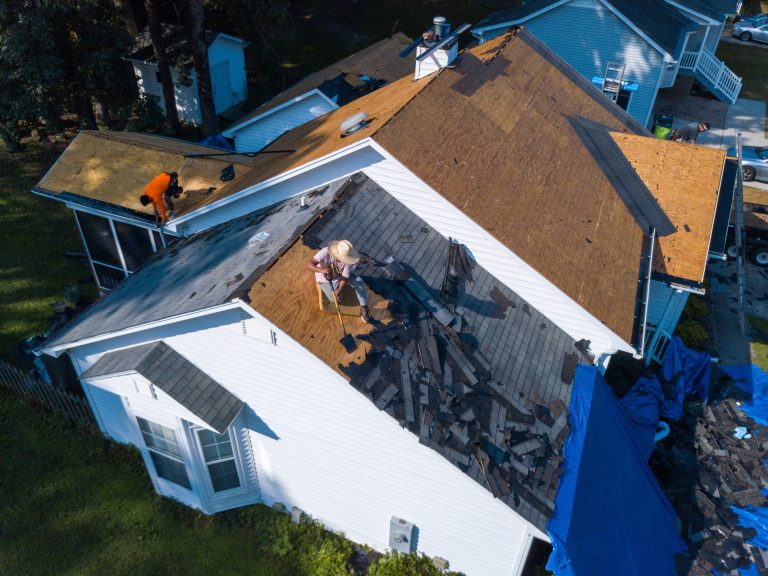 Reasons to Replace Your Roof blog - roof being replaced